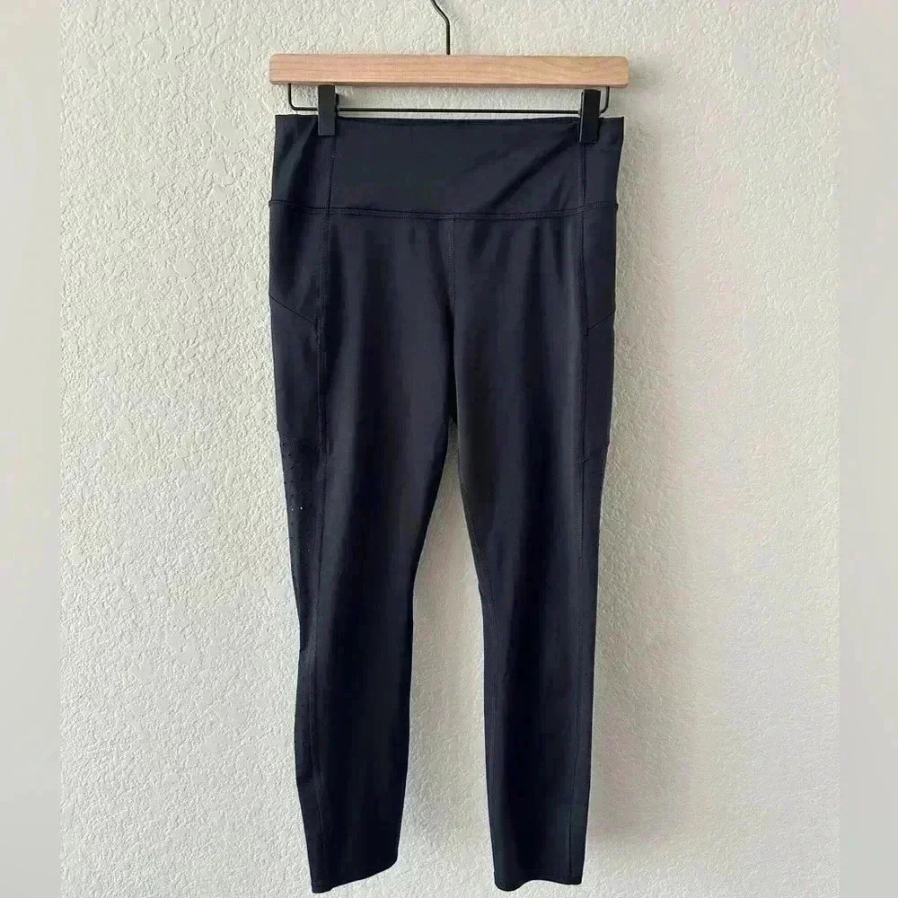 Athleta Black Women’s Yoga Athletic Leggings Cut out Pattern on Legs Size Small